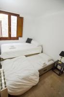 Postel nebo postele na pokoji v ubytování Galligants Apartment