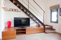 TV a/nebo společenská místnost v ubytování Galligants Apartment