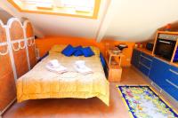 Posteľ alebo postele v izbe v ubytovaní Incanto Sorrentino - De Vivo Realty Sorrento