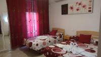 A bed or beds in a room at Hostal Huespedes Toledo