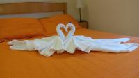A bed or beds in a room at Hostal Huespedes Toledo