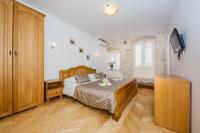 Posteľ alebo postele v izbe v ubytovaní Villa Spaladium