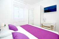 Posteľ alebo postele v izbe v ubytovaní Apartments Town