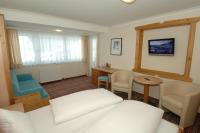 Cama ou camas em um quarto em Landhotel Oberdanner
