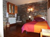 A bed or beds in a room at Can Mahola