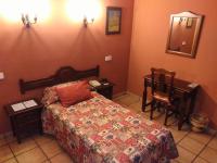Posteľ alebo postele v izbe v ubytovaní Hotel Riavela