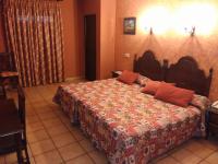 Posteľ alebo postele v izbe v ubytovaní Hotel Riavela