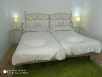Posteľ alebo postele v izbe v ubytovaní Apartamentos Rurales Las Caleras