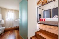 A bed or beds in a room at Ca' Moro Salina