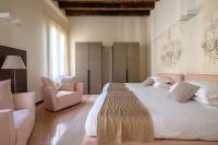 A bed or beds in a room at Ca' Moro Salina