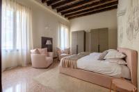 A bed or beds in a room at Ca' Moro Salina