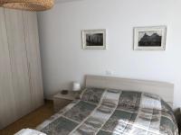 Posteľ alebo postele v izbe v ubytovaní Miky Home