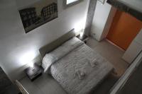 Posteľ alebo postele v izbe v ubytovaní Home Greco