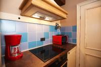 Kuchyň nebo kuchyňský kout v ubytování Apartment Yelica
