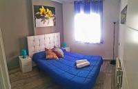 A bed or beds in a room at nada