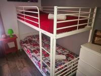 A bed or beds in a room at nada