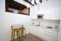 Kuchyň nebo kuchyňský kout v ubytování Apartamento San Fernando 27