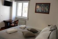 A bed or beds in a room at B&B CultRoma Roof Garden