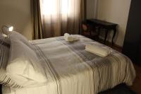 A bed or beds in a room at B&B CultRoma Roof Garden