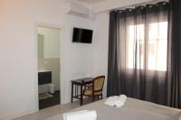 A bed or beds in a room at B&B CultRoma Roof Garden