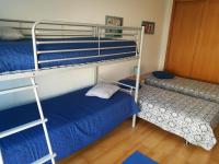 Postel nebo postele na pokoji v ubytování São Martinho do Porto