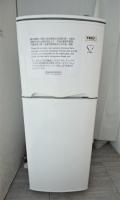 a white refrigerator is sitting in a room at Inn Cube - Taipei Main Station in Taipei