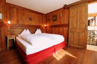 Łóżko lub łóżka w pokoju w obiekcie Eco Chalet Maison Dominique