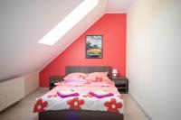Posteľ alebo postele v izbe v ubytovaní Apartament Luna