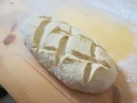a dough sitting on top of a cutting board at Masseria Le Terrazze di Serranova in Serranova