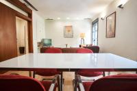 A seating area at Setefilla Deluxe Suite by Valcambre