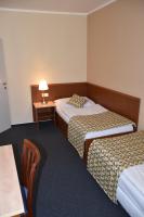 Posteľ alebo postele v izbe v ubytovaní Aparthotel Austria Suites