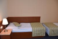 Posteľ alebo postele v izbe v ubytovaní Aparthotel Austria Suites