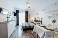 Telewizja i/lub zestaw kina domowego w obiekcie Apartamenty Królewska Kwatera