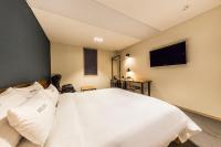 Incheon Airport Hotel Seattleにあるベッド