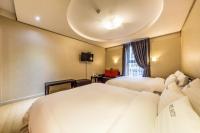 Incheon Airport Hotel Seattleにあるベッド