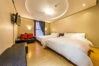 Incheon Airport Hotel Seattleにあるベッド