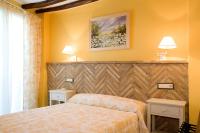 Postel nebo postele na pokoji v ubytování Hotel Rural El Pilaret