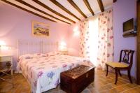 Postel nebo postele na pokoji v ubytování Hotel Rural El Pilaret