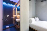 A bed or beds in a room at Pietra - The Italian Stay Collection