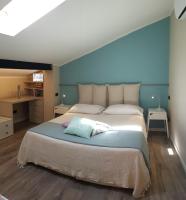 Posteľ alebo postele v izbe v ubytovaní Vieni & Vai a Verona