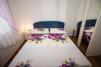 Postel nebo postele na pokoji v ubytování Apartments Milina