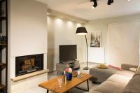 Televízia a/alebo spoločenská miestnosť v ubytovaní Evangelie Luxury Residence