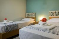 Posteľ alebo postele v izbe v ubytovaní Evangelie Luxury Residence