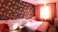 Hotel Astraにあるベッド
