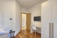 Televízia a/alebo spoločenská miestnosť v ubytovaní Adriatic Apartments Fažana