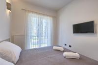 Posteľ alebo postele v izbe v ubytovaní Adriatic Apartments Fažana