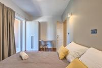 Posteľ alebo postele v izbe v ubytovaní Adriatic Apartments Fažana
