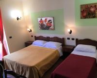 A bed or beds in a room at Il Melograno