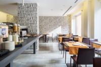 Restauracja lub miejsce do jedzenia w obiekcie Hotel Tiziano - Gruppo Mini Hotel