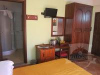 A bed or beds in a room at Il Melograno